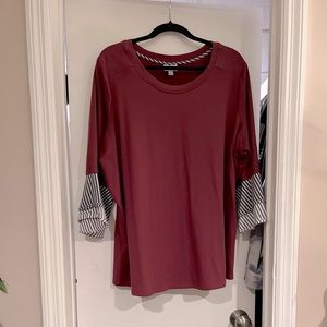 3/4 length flare sleeve burgundy and striped shirt.